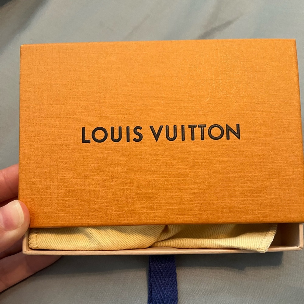 Louis Vuitton Bold Orange Gift Box and multicolor bracelet